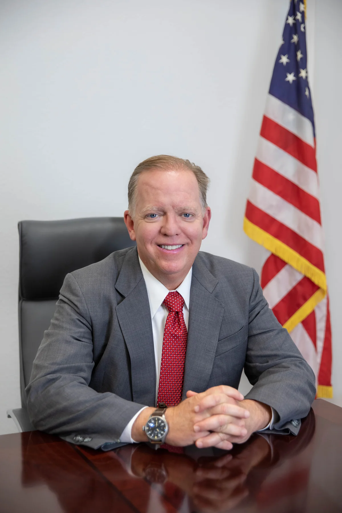 Herb Morgan seated at his desk